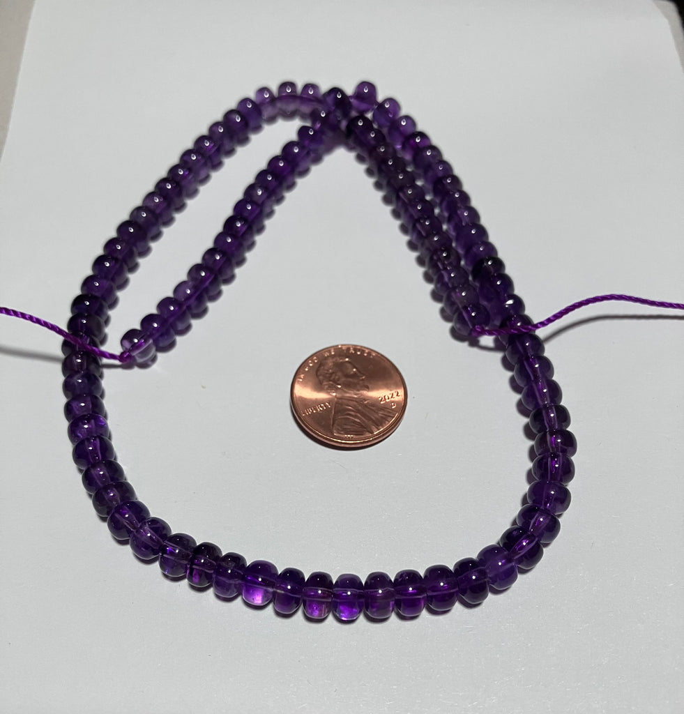 V 142 Amethyst Bead Strand
